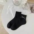 Black ribbed cotton socks with delicate white bows and heart charms in balletcore style - Black
