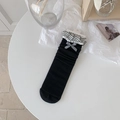 Chic black slouch socks featuring a double-layered ruffle cuff and a plaid bow detail - Black with Plaid Bow
