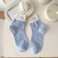Light blue crew socks with apple button detail and colorful speckle yarn for women - Blue