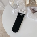 Elegant black mid-calf socks with white lace trim and a pearl bow decoration - Black Pearl Bowknot