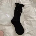 Japanese style black polka dot mid-calf socks with ruffle trim and bubble cuffs - One Size / Black