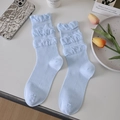 Chaussettes bleu clair à volants avec texture en maille et style doux coloré - Taille unique / Bleu