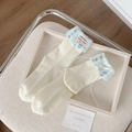 Beige cotton socks featuring light blue plaid cuffs and a delicate white silk ribbon bow - Blue Foldover