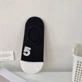 Fantasmini in cotone bianco e nero con texture a coste e numero 5 ricamato - Numero 5 Base Nera