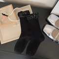 Sparkly black crew socks with sequined cuffs and ribbed cotton texture for women - One Size / Black