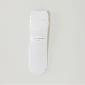 White lace hollow-out mid-calf socks with floral crochet pattern in original packaging - One Size / White