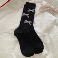 Black mid-calf socks with light purple velvet bows and ribbed knit texture - One Size / Black