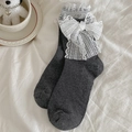 Dark grey crew socks featuring white lace trim and a sweet bow detail for women - One Size / Dark Gray