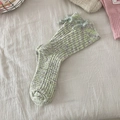 Knit cashmere wool socks in green and purple floral yarn with bow tie cuff detail - One Size / Green (With Flecks)