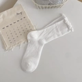 White cotton mesh socks for women featuring ruffled edges and breathable knit texture - One Size / White