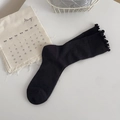 Elegant black crew socks featuring ruffled lettuce edges and soft cotton knit fabric - One Size / Black