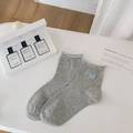 Grey rib-knit crew socks with lettuce edge cuffs and blue butterfly embroidery - One Size / Gray