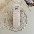 Cremefarbene Kniestrumpf mit rosa Schleife und aufwendigem Rauten-Zopfmuster - Creme-Diamant-Schleifen-Stil
