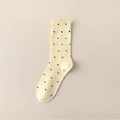 Creamy yellow crew socks with black polka dots and delicate ruffled edges for women - One Size / Yellow