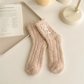 Beige coral fleece socks with ribbon bows in a cozy home setting, thermal style - One Size / Brown
