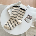 Calze beige a righe con polsini neri a costine dal design retrò e minimalista chic - Beige a Righe Nere