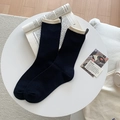 Calze blu scuro con bordo crema a contrasto e linguetta decorativa nera sul tallone - Nero (Bordo Beige)