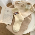 Cream teddy bear embroidered thermal socks with ruffled cuffs in a cozy winter setting - One Size / Light Yellow