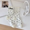 Creamy white crew socks with black bow patterns and elegant ruffle lace cuffs - One Size / White Bow (1 Pair)