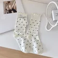 White crew socks with black polka dots, ruffle edges and silver bow details - One Size / White Polka Dot (1 Pair)