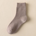 Coffee brown thermal crew sock with thick ribbed cuffs on a beige leather background - Light Coffee