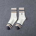 White crew socks featuring brown stripes and grey accents with minimalist embroidery - Long Style / White