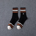 Black crew sports socks with orange and white stripes and circular logo embroidery - Long Style / Black