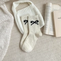 Beige crew socks with colorful flecks and black bow design for a cozy autumn look - Bow Style (YM1145)