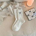 White wool socks with black bow embroidery and thick thermal knit for winter style - White