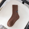 Dark brown knitted thermal crew socks with black SUS label and ribbed elastic texture - One Size / Light Coffee