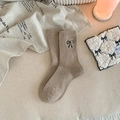 Thick beige wool socks for women with black bow embroidery in a vintage style - Khaki