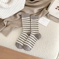 Striped knit cotton blend socks in grey and white with ribbed cuffs on white surface - One Size / Khaki