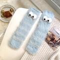 Fuzzy light blue socks with funny 3D cartoon eyes and plush thick winter material - One Size / Blue