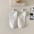 White low-cut cotton socks featuring a cute cartoon eye embroidery on the heel - Pure White