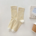 Yellow and white striped cotton mid-calf socks for women in a cozy lifestyle setting - One Size / Yellow Plaid