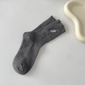Distressed dark grey crew socks with hole details and safety pin embroidery design - One Size / Dark Gray