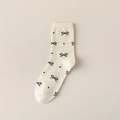 Calze beige in maglia coriandolo per donna con motivi a fiocco nero in morbido cotone - Fiocco a Pois