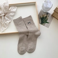 Light coffee cotton crew socks with black bow embroidery and vertical ribbed texture - One Size / Brown