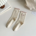 Off-white rainbow yarn socks featuring pink ruffled edges and bow embroidery detail - Pink Bow