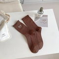 Dark brown ribbed knit socks with sparkling rhinestone bows and ruffled cuffs - One Size / Brown