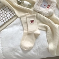 Creamy white cotton socks featuring delicate red bow embroidery and ribbed cuffs - One Size / Rice White with Bow