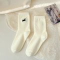 Plush cream socks with black cat embroidery made of thick warm thermal fleece material - Cat