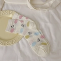 Cream mesh crew socks featuring colorful oval patterns and cute cartoon smile faces - Polka Dot Smile Style