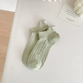 Light green knit ankle socks featuring a white bow embroidery on the heel for women - Green