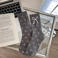 Dark grey ribbed mid-calf socks with white bows and pearl detail in a cozy setting - One Size / Grey 1 Pair