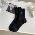 Calcetines negros con elegantes bordes con volantes y lazos blancos bordados - Talla única / Estilo Liso / Negro