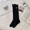 Chic black ribbed cotton knee-high socks featuring white bee embroidery and bow detail - One Size / Calf Socks - Black Bee
