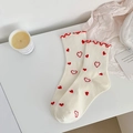 Off-white crew socks with red heart embroidery and feminine ruffled lettuce edge cuff - Red Heart Style
