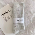 Hellgraue Thermosocken aus Plüsch mit buntem Punktgarn und weißer Papierbanderole - Grau Gesprenkelt