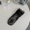 Elegant black lace leg warmers with floral embroidery and ruffle trim detail - One Size / Large Flower Pattern / Black